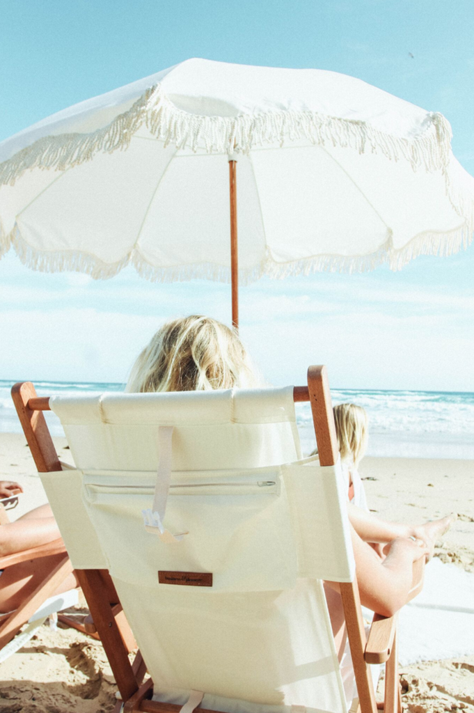 Is a beach umbrella better than sunscreen?